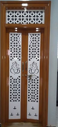 two doors with decorative designs on them