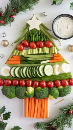 christmas tree shaped veggie platter with vegetables and dip