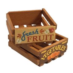 a wooden crate filled with fruit and vegetables