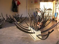 there is a sculpture made out of metal branches