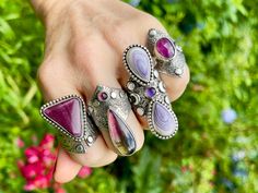 Purple Spiny Oyster + Sterling Silver Ring, Size 8.75 - This stunning handcrafted ring showcases a striking deep purple Spiny Oyster, on a textured open band. The oxidized silver and intricate details give off a cool bohemian ocean-inspired feel. Ring Size: 8.75 Stones: Spiny Oyster Stone Setting: .75"H x .75"W (top) Overall Height: 1" Ring tip to stone top Ring Band: .75" front & tapers to .25" back Materials: Fine Silver & Sterling Silver Stamped .925 & custom Makers Mark Handcrafted in CT, US Ring Drawing, Goddess Ring, Raven Jewelry, Sterling Silver Garnet Ring, Pink Sapphire Ring, Top Rings, Spiny Oyster, Rhodolite Garnet, Stone Setting