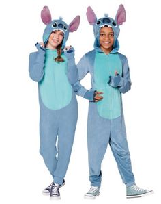 Become your favorite movie character of all-time when you wear this officially licensed Kids Stitch Jumpsuit. This Halloween costume includes a hooded jumpsuit that features Stitch's ears! Put on this jumpsuit and instantly transform into Stitch with ease. Officially licensed Includes: Hooded jumpsuit Gloves Long sleeves Zipper closure Material: Polyester, spandex Care: Spot clean Imported Lilo And Stitch Onesie, Adult Onesie Costume, Stitch Onesie, One Piece Costume, Stitch Costume, Animal Onesies, Adult Onesie Pajamas, Onesie Costumes, Animal Onesie