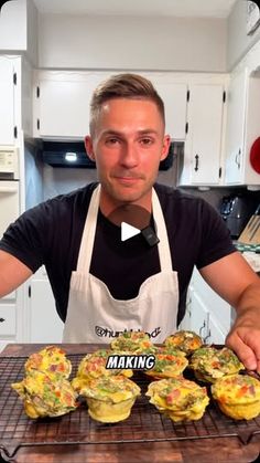 a man in an apron is making muffins