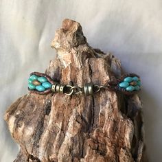 Soutwestern Inspired Superduo and Tila Bead Leather Bracelet - Etsy Southwestern Brown Hand Wrapped Bracelets, Adjustable Beaded Turquoise Leather Bracelet, Adjustable Turquoise Beaded Leather Bracelet, Rustic Adjustable Turquoise Beaded Bracelets, Bohemian Leather Beaded Bracelet For Healing, Bohemian Turquoise Leather Bracelet With Round Beads, Leather Bracelets With Round Beaded Details, Southwestern Hand Wrapped Beaded Bracelets, Rustic Handmade Turquoise Beaded Bracelets