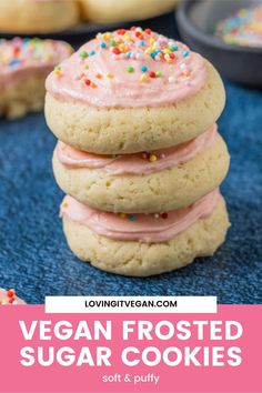 vegan frosted sugar cookies stacked on top of each other