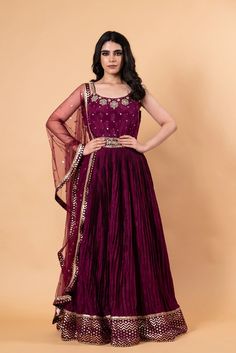 Color: Wine Purple
Fabric: Crepe Silk
Work: Embroidery, Stonework
Neck Line: Round
Sleeves: Sleeveless
Closure: Side Zip Closure
Can Can: No
Set Consists of 1 Gown and 1 Dupatta Floor-length Dress In Raw Silk With Intricate Embroidery, Floor-length Raw Silk Gown With Intricate Embroidery, Floor-length Raw Silk Dress With Intricate Embroidery, Semi-stitched Embroidered Silk Gown, Semi-stitched Silk Embroidered Floor-length Fabric