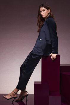 Sharp Suiting Is Just The Thing For Making A Bold Impression. Do It With Ease With Our Tailored Satin Pants - They Come Cut To A Flattering High-Rise Fit And Feature Cropped Hems And A Matching Blazer  To Show You Mean Business. Luxury Tailored Suit With High-waisted Pants, Luxury Straight Pants With Structured Boning, Tailored Red Trousers, Luxury Satin Trousers, Luxury Black Trousers, Satin Trousers, Satin Pants, Slim Fit Trousers, Tailored Trousers