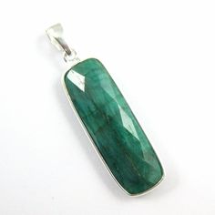 Bezel Gem Pendant with Bail-Emerald Dyed Sterling Silver Rectangle Bezel 40mm Frame and Bail Material: Solid Genuine .925 Sterling Silver.  Shape: Faceted elongated rectangle bar shape on both sides.  Stone: Emerald Dyed Bail: Inner measurement 3.5 mm by 6 mm Measurement: Approximately Stone size is 30 x 11 mm, Approximately 41 mm long with bail Weight:  Approximately 4.1 grams per piece. SKU#: 601114-EMR Quantity : 1 pendant For all available stones, click here We carry these beautiful bezel st Extra Long Necklace, Gem Pendant, Sterling Silver Anklet, Bezel Pendant, Silver Anklets, Jewelry Making Charms, Silver Chain Necklace, Silver Frame, Gold Plated Sterling Silver