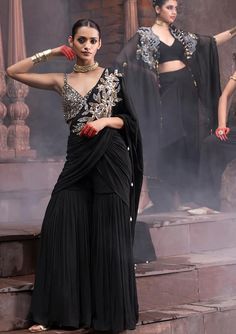 Black pre-draped sharara saree with floral sequin embellished patterns. Comes with padded bead, mirror, sequin embellished blouse. - Aza Fashions Bead Mirror, Sharara Saree, Saree Gowns, Dhoti Saree, Cotton Sarees Handloom, Ruffle Saree, Embellished Blouse, Lehenga Saree, Blouse For Women