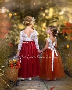 Embrace the enchanting allure of autumn weddings with our Long Sleeve Burnt Orange Flower Girl Dress. Crafted from delicate lace and flowing tulle, this dress embodies a perfect blend of boho and bohemian chic. Its rich burnt orange hue captures the essence of fall foliage, making it an ideal choice for any fall wedding theme. The long sleeves add an elegant touch while providing warmth for cooler weather, ensuring your little flower girl looks stylish and feels comfortable throughout the celebr Rust Flower Girl Dress, Fall Flower Girl, Fall Flower Girl Dresses, Rustic Flower Girl Dress, Boho Flower Girl, Long Flower Girl Dresses, Rustic Flower Girls, Pretty Redhead, Bachelorette Ideas