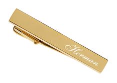 "This custom engraved high quality gold tie clip is a great accent to keep your suit & tie looking sharp. The clip can be engraved with a name, initials or date. A personalized tie clip really adds a sense of sophistication and style to your formal wear. THERE ARE 3 WAYS TO PERSONALIZE YOUR TIE PIN Please make sure you select your initials in the order you would like them to appear as we do not reformat the order once submitted. #1 John (FIRST NAME) Smith (LAST NAME) Michael (MIDDLE NAME) (L Classic Gold Suit And Tie Accessories For Formal Events, Classic Gold Suit And Tie Accessories For Formal Occasions, Elegant Gold Rectangular Suit And Tie Accessories, Gold Suit And Tie Accessories For Father's Day, Classic Gold Suit And Tie Accessories, Formal Engraved Cufflinks, Wedding Tie Clip, Gold Clip-on Cufflinks For Business, Gold Tie Clip