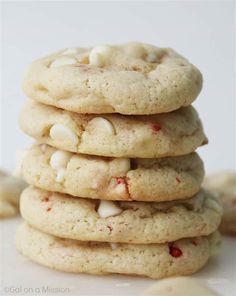 a stack of cookies with white chocolate chips