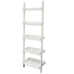 a white shelving unit with four shelves