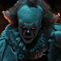 the evil clown from it's movie, it looks like he is pointing at something