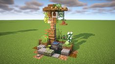 a small tree house in the middle of a green field with flowers and plants growing out of it