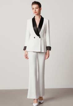 Black and white tuxedo blazer Look your absolute best in this sophisticated black and white tuxedo blazer suit. Tailored for an exquisite fit, this elegant women's pantsuit offers timeless style and an enviable silhouette. Crafted with exquisite details, this exquisite garment will be a fashionable addition to your wardrobe. Description: V-neck Long sleeves, button cuffs. Black satin lapels Structured shoulders. Wide leg pants Imported Brand - Aision Model Number - 201019C1+P3 Washing Care: Reco Luxury Tuxedo-style Pantsuit With Lapel Collar, Female Tuxedo Pearls, White Tuxedo Blazer Women, Luxury White Blazer For Black-tie Events, Black And White Suit Women, White Suit Women, Women's Pantsuit, Blazer Look, Black And White Suit