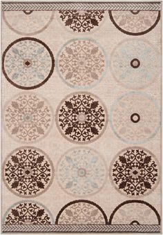 an area rug with various circular designs on it