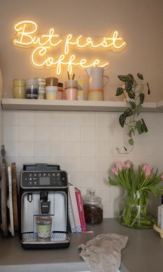 a coffee maker sitting on top of a kitchen counter