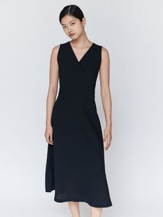 Editor's Notes The layered dress has a neat and luxurious look. The fit and flare silhouette creates a feminine mood. - Open back silhouette- Layer with a shirt or bra top when wearing daily- Wear alone as a special piece- Cross back designMeasurements(in.)34 / 36- Shoulder: 13.39 in. / 13.98 in. - Waist: 14.17 in. / 15.16 in. - Bottom Hem: 36.61 in. / 37.8 in. - Total Length: 47.83 in. / 48.23 in.*There may be Â±5% of error depending on each product*There may be Chic A-line Wrap Dress For Formal Occasions, Chic Maxi Dress With Flattering Silhouette For Work, Sleek H-line Workwear Dresses, Black Structured Semi-formal Dress, Chic A-line Midi Dress For Work, Chic Formal Sleeveless A-line Dress, Classic A-line Workwear Dresses, Elegant A-line Dress For Work, Chic Fit And Flare Maxi Dress For Work