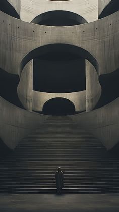 a man is standing in front of some stairs