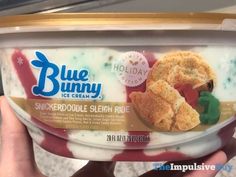 blue bunny ice cream is in someone's hand