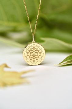 If you wish we can personalize your 14k Solid Gold Sri Yantra Necklace. A Dainty and unique gift for Birthdays, Graduations, Weddings and Anniversaries. ● MATERIAL 14k SOLID GOLD ● Chain Length or Without Chain - Without Chain - 40 cm / 16 inches - 45 cm / 18 inches - 50 cm / 20 inches ● PENDANT SIZE [The jump ring (bail) is not included in the measurements] - 13 mm / 0.51 Inches diameter - 14 mm / 0.55 Inches diameter - 15.3mm / 0.6 Inches diameter - 16.5mm / 0.65 Inches diameter - 19 mm / 0.75 Spiritual Yellow Gold Necklaces For Wedding, Traditional Jewelry With Engraving Option As Gift, Traditional Jewelry With Engraving Option For Gift, Traditional 14k Stamped Necklace As Gift, Traditional 14k Stamped Necklace For Gift, 14k Gold Symbolic Necklace For Wedding, Traditional Engraved Jewelry As Gift, Spiritual Round Pendant Necklaces With Engraving Option, Spiritual Pendant Necklaces With Engraving Option