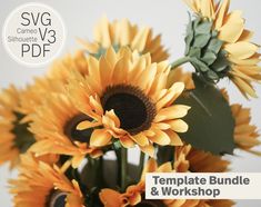 a vase filled with yellow sunflowers on top of a table