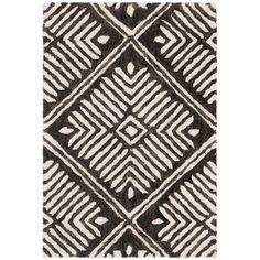 a black and white rug with an intricate design