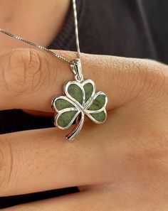 "**ANNOUNCEMENT** WE OFFER HALF PRICE FEDEX SHIPPING AT ONLY $20 SO YOU GET YOUR ORDER ON TIME FOR CHRISTMAS! (SELECT AT CHECKOUT)The shamrock is an iconic Irish emblem. Legend has it that it was plucked from the land by St Patrick to explain his belief in the Trinity. This pendant is crafted in sterling silver and Connemara marble, a stone dating back to ancient times that's known as \"Ireland's gemstone\". Our Connemara marble is authentic, from the Joyce family mine in Connemara. This stunnin Silver Gemstone Jewelry For Good Luck, Green Sterling Silver Jewelry For Good Luck, Sterling Silver Green Jewelry For Good Luck, Shamrock Necklace, Irish Jewelry Necklaces, Shamrock Jewelry, Irish Necklace, Four Leaf Clover Necklace Silver, Irish Earrings