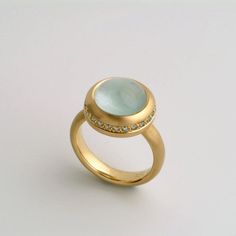 Large Natural Aquamarine Cabochon Ring 18k Gold for Women | Etsy Luxury Light Blue Round Rings, Luxury Light Blue Round Ring, Modern Yellow Gold Round Moonstone Ring, Elegant Round Cabochon Topaz Ring, Elegant Blue Topaz Cabochon Ring, Modern Aquamarine Ring With Center Stone, Elegant Light Blue Round Rings, Elegant Moonstone Ring With Aquamarine Gemstone, Elegant Round Aquamarine Ring