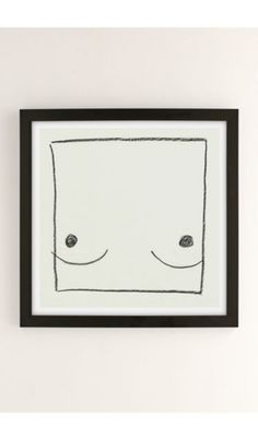 a black and white framed drawing of a square with two eyes on it's face