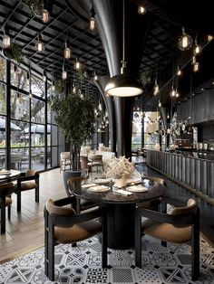 a restaurant with tables and chairs, lights hanging from the ceiling and windows on both sides