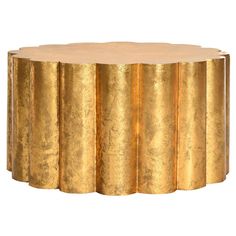 a gold coffee table with four sections on each side and one section in the middle