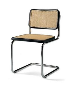 a chair with a woven seat and metal frame