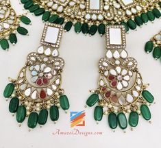 Green (Emerald) Sheesha Necklace Earrings Tikka and Jhoomer Set. Available to be shipped for FREE from Canada to USA, Europe, Italy, Norway and everywhere else. Explore more PUNJABI BRIDAL JEWELLERY SETS 👉 PUNJABI BRIDAL JEWELLERY ONLINE 🛒 INDIAN BRIDAL JEWELLERY 📦Unmatched FREE Worldwide Shipping Jasmine, Canada ⭐️⭐️⭐️⭐️⭐️ Yea and i loved the packing and the the (choora)bridal bangles, i wore it on my anniversary.. thanks a lot.. they Are amazing every person looked at them & were curiou Green Bohemian Jewelry For Diwali, Bohemian Green Jewelry For Diwali, Bohemian Green Kundan Necklace For Diwali, Bohemian Green Chandbali Kundan Necklace, Green Kundan Necklace With Matching Earrings For Festivals, Bohemian Green Kundan Necklace For Festivals, Green Bohemian Kundan Necklace For Festivals, Green Jewelry Sets With Latkans For Gifts, Green Bollywood Jewelry Sets With Latkans