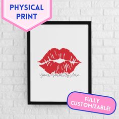 a red lipstick print on a white brick wall next to a black frame with the words,