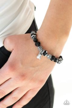 A collection of black crystal-like beads and ornate silver beads are threaded along a stretchy band around the wrist. An abstract silver heart charm swings from the center, for a romantic finish. Sold as one individual bracelet. P9WH-BKXX-176XX Squirrel Jewelry, Nickel Free Jewelry, Black Bracelet, Paparazzi Accessories, Black Bracelets, Affordable Jewelry, Paparazzi Jewelry, Red Crystals, Black Crystals