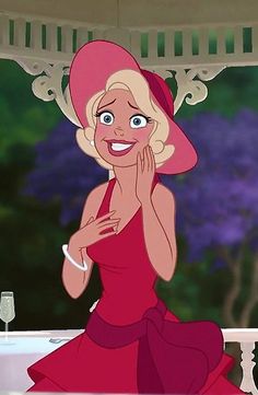 a woman in a red dress and pink hat