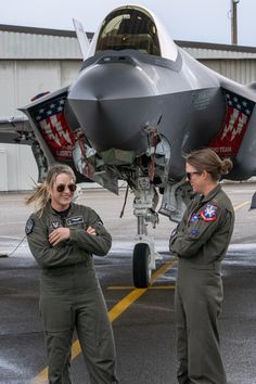 Capt. Aimee "Rebel" Fiedler (right), an F-16 pilot from Shaw Air Force Base, S.C., and Maj. Kristin "Beo" Wolfe, an F-35A demo team pilot from Hill Air Force Base, Utah talk casually in from of an F-35A Lightning II parked at Portland Air National Guard Base, Ore, May 19, 2022. These pilots are set to perform in this year's Oregon International Air Show in Hillsboro, May 20-22, where the theme is women in aviation. (U.S. Air National Guard photo by Staff Sgt. Alexander Frank) Us Navy Fighter Pilot, Female Air Force Pilot, Air Force Pilot Woman Aesthetic, Airmen Air Force, Air Force Photography, U.s. Air Force Women, Air Force Lifestyle, Royal Air Force Aesthetic, Women In Air Force