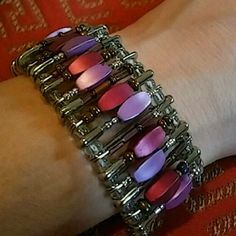 a close up of a person wearing a bracelet