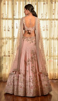 Editor's Note The pale pink chiffon kalidar chikankari lehenga with parsi embroidery must be quite intricate and delicate, while the chiffon blouse and tulle dupatta add a lightness to the overall look. This would be a great outfit for a wedding or other formal event. Fabric: Chiffon; tulle Color: Pale pink Components: Lehenga, blouse and dupatta Occasion: Wedding Disclaimer: Product color may slightly vary due to photographic lighting sources or your monitor setting. Care: Dry clean only About Pink Chikankari Lehenga, Parsi Embroidery, Chikankari Lehenga, Blouse Chiffon, Organza Lehenga, Bridal Lehenga Collection, Bridal Lehenga Red, Blouse Silk, Pink Lehenga