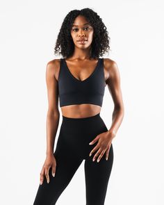 HIGHLIGHTS Second skin. Cut and sew knit. Deep-V neckline. Alphalete wolf logo. A/B cup.. FIT SUGGESTION. This item runs true to Alphalete’s standard fit.. If you are between sizes, we recommend sizing up. Sydney is 5’2”/157.5cm, wearing a size S with a 31”/89cm bust... Le'Neisha is 5’8”/172.7cm, wearing a size XS with a 31”/78.7cm bust.. MATERIALS AND WASHING DIRECTIONS. 70% Nylon, 30% Spandex. We recommend washing inside-out on a cold setting. Hang to dry Tenacity is our newest high performanc Wolf Logo, Perfect Ten, B Cup, Soft Hands, Performance Fabric, Second Skin, Deep V, Athleisure, High Performance