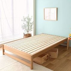 a bed with wooden slats in a room