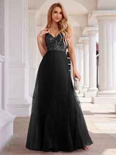 This sophisticated evening dress features a V-neck sleeveless top and a shimmering sequined bodice. The high-waisted tulle skirt enhances its ethereal look, while the open back adds a touch of design. Fit: Please refer to size chart. Length: Floor Length. Sleeve Style: Sleeveless. Closure: It is concealed a zipper up the back. Undergarments: It is not padded, with lining. Fabric:The garment comprises tulle. Stretch: Fabric is no stretch. Glamorous Tulle Sequin Dress With Contrast Sequin, Sleeveless Tulle Sequin Party Dress, Sleeveless Embellished Sequin Tulle Dress, Sleeveless Tulle Sequin Dress For Party Season, Sleeveless Sequin Tulle Dress For Party Season, Contrast Sequin Evening Dress For Prom Gala, Embellished Sleeveless Sequin Tulle Dress, Contrast Sequin Evening Dress For Prom And Gala, Evening Tulle Dress With Contrast Sequin