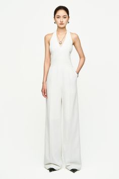 This jumpsuit is crafted from high-quality twill fabric, ensuring durability and comfort. The halter neckline and side pockets provide practicality, while the floor-length design adds elegance. Perfect for both casual and formal occasions, this jumpsuit offers versatility and effortless style. Length:- Top body: 40cm/41cm/42cm (S/M/L)- Low body: 104cm/105cm/106cm (S/M/L) Elegant Strapless Halter Neck Jumpsuit For Spring, Elegant Halter Neck Strapless Jumpsuit For Spring, Formal Halter Neck Jumpsuits And Rompers For Summer, Formal Halter Neck Jumpsuit For Summer, Elegant Halter Neck Jumpsuits And Rompers For Formal Occasions, Elegant Formal Halter Neck Jumpsuits And Rompers, Elegant Formal Halter Neck Jumpsuits, Summer Formal Strapless Halter Neck Jumpsuit, Formal Strapless Halter Neck Jumpsuit For Summer