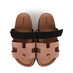 This pair of Hermes Chypre Goatskin sandals are in Rose Perle/Noir Suede with black rubber sole, adjustable strap, and silver hardware in size 38 EU. Origin: ItalyCondition: New and never Accompanied by: Hermes box, dustbagsSize: 38 EU Hermes Box, Prada Crossbody, Prada Crossbody Bag, Hermes Bags, Diaper Backpack, Casual Backpack, Black Rubber, Chanel Handbags, Silver Hardware