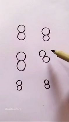 someone is writing numbers on paper with a pencil