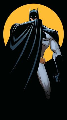 batman standing in front of the moon with his hands on his hips