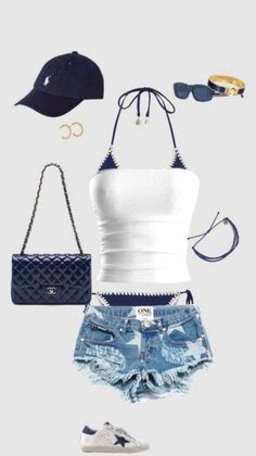 a white tank top and denim shorts are arranged in the shape of a woman's outfit