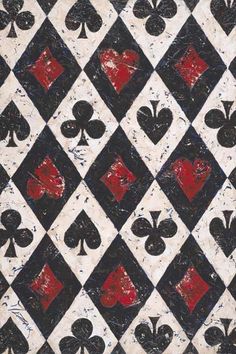 an image of playing cards with hearts and spades painted on the back side of it